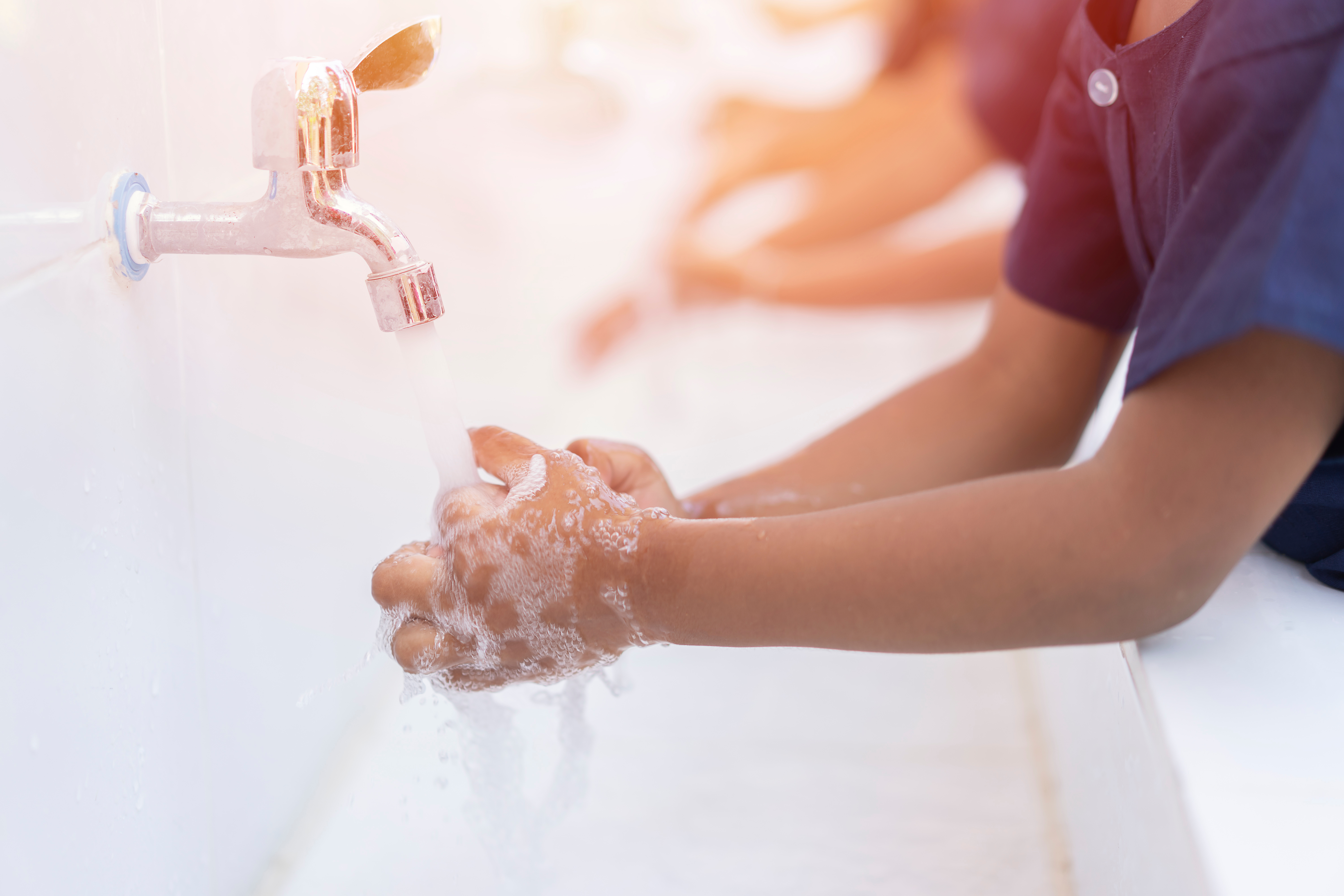 Individual washing hands