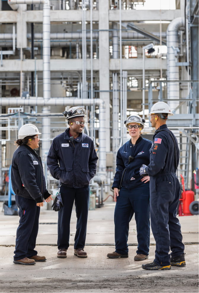 A group of workers at a production plant