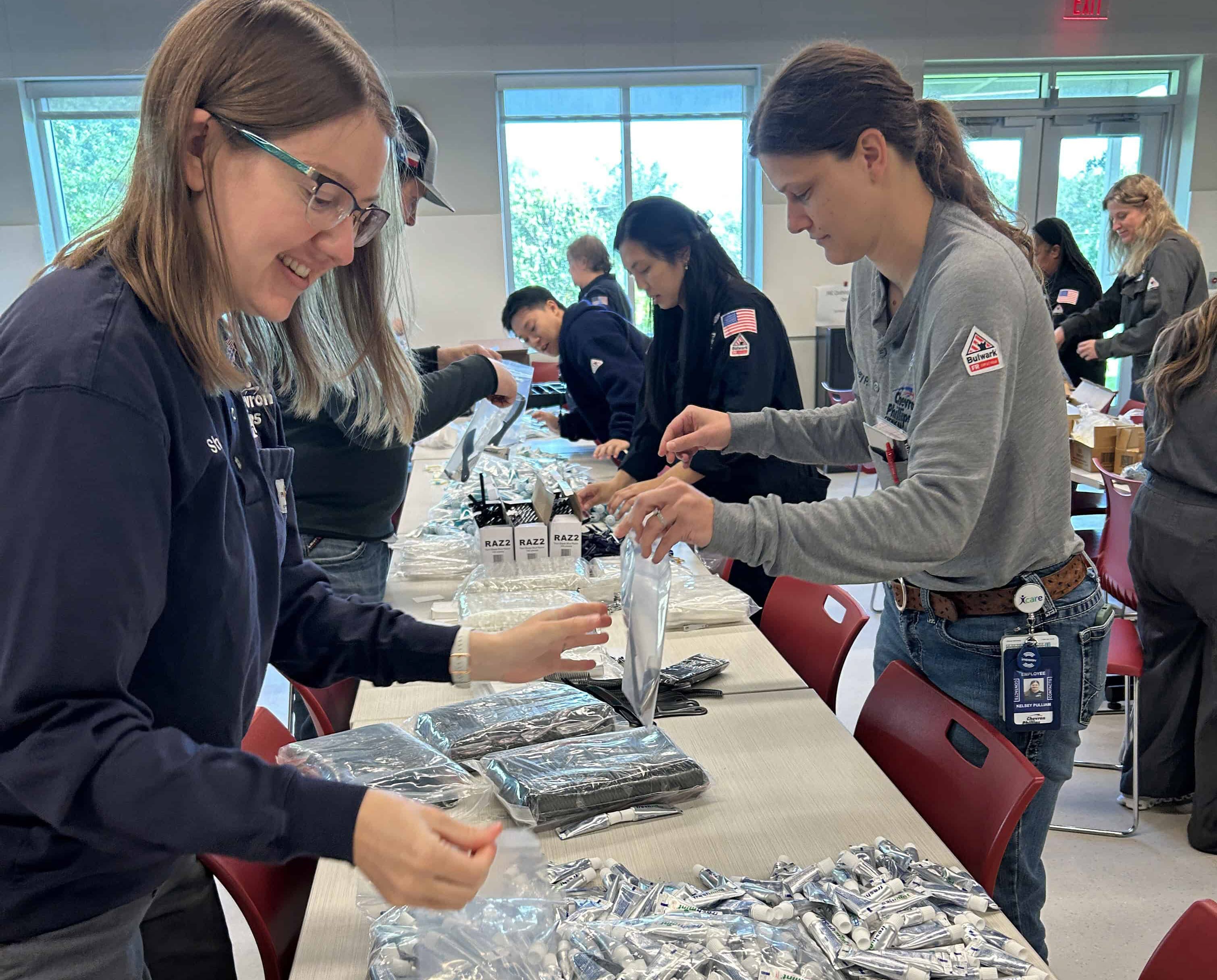 CPChem employees at Chervon Phillips Chemical’s Sweeny, Clemens & Old Ocean facility in Sweeny, Texas, assemble hygiene kits for distribution to community organizations in their community.