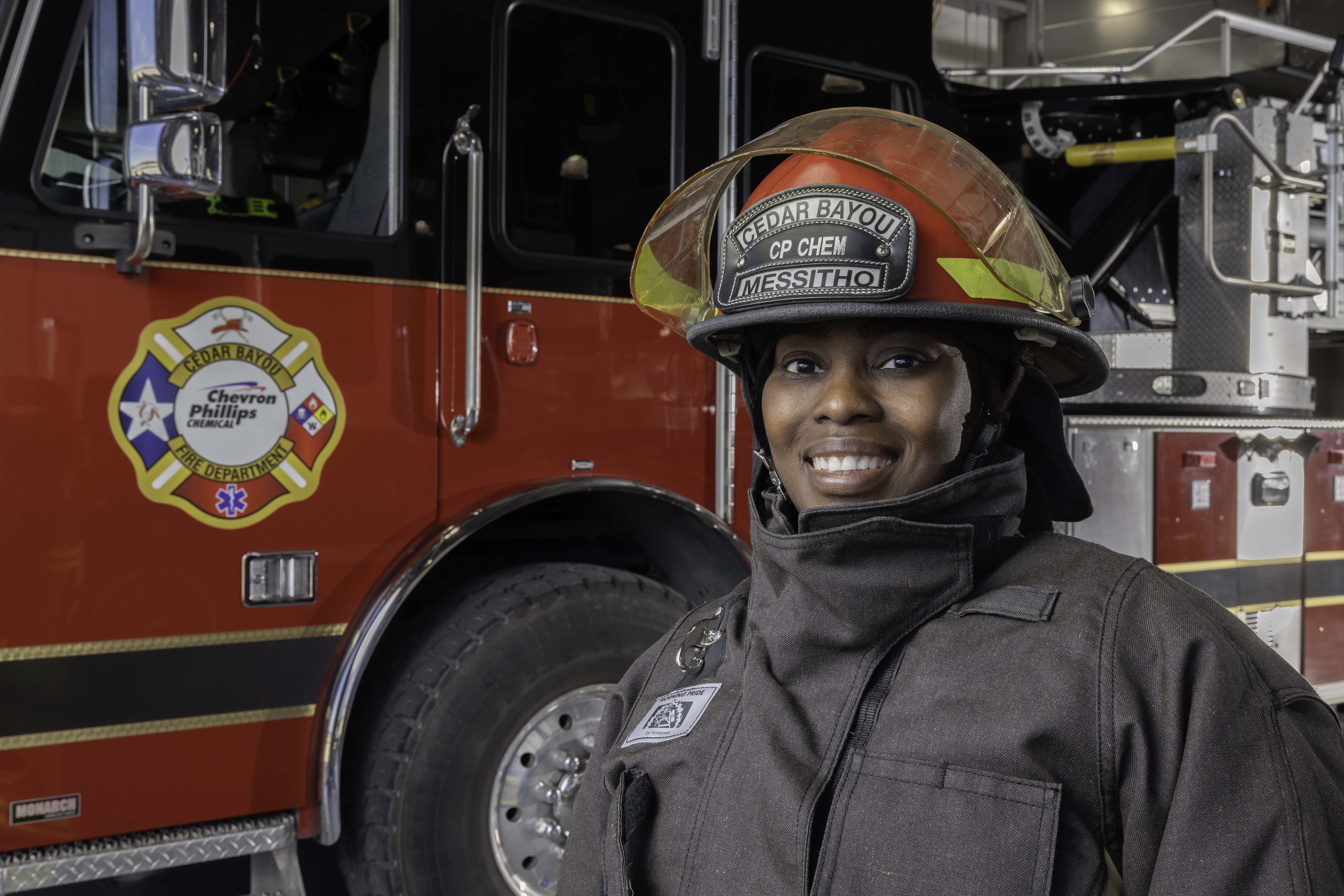Female in her firefighting gear 