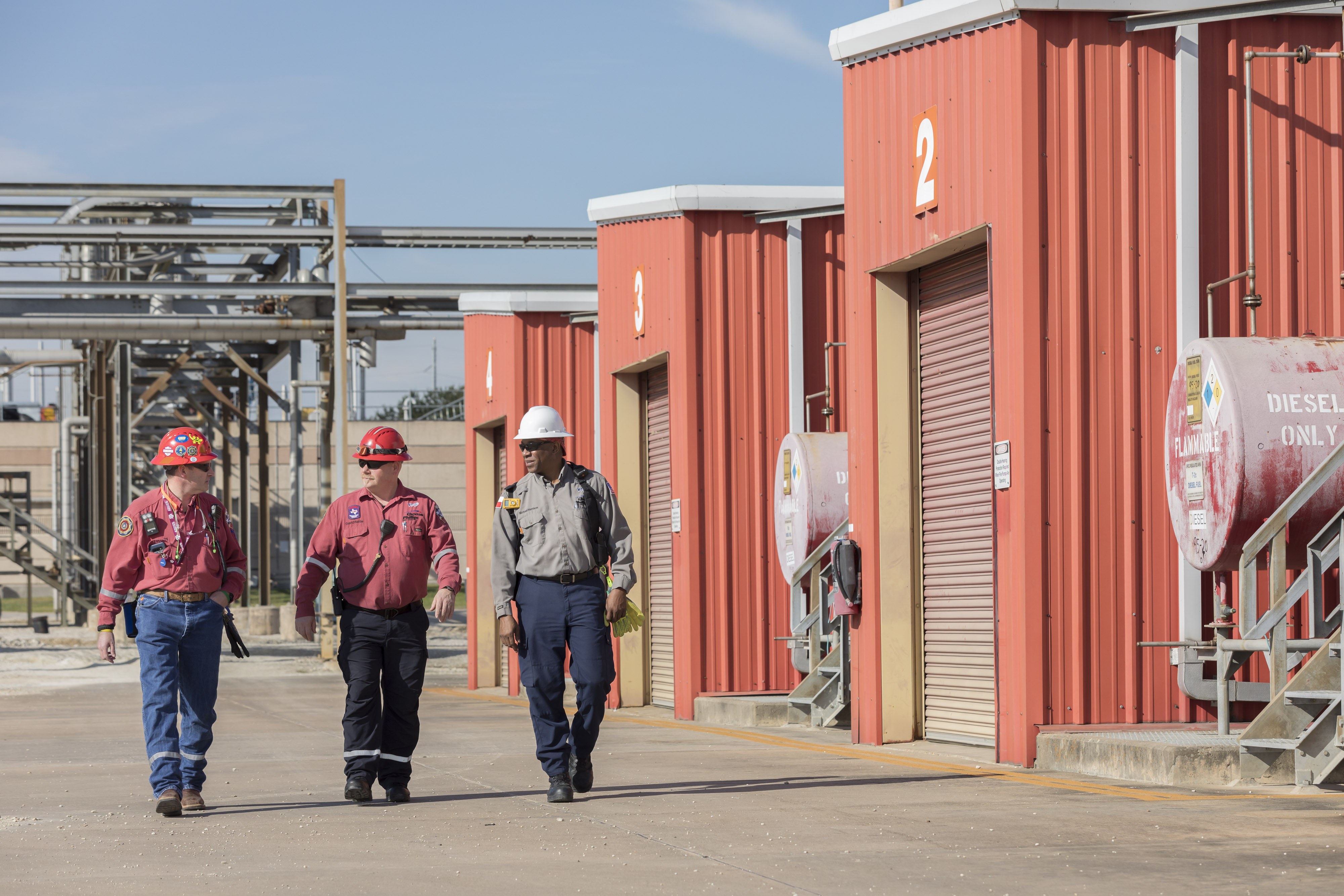Employees walking by fire station